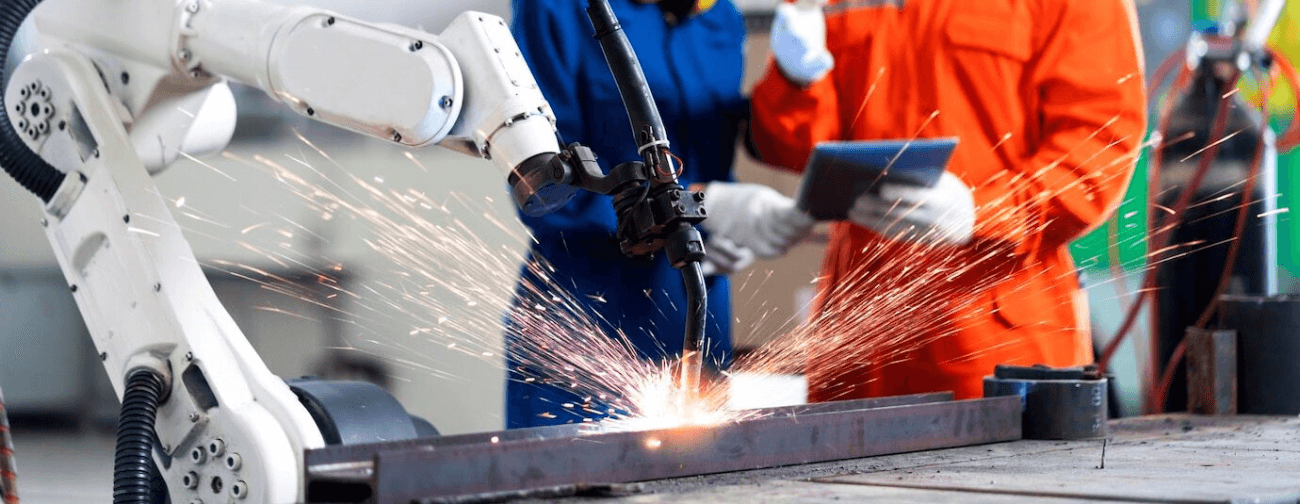 engineer-cooperation-male-female-technician-maintenance-control-relay-robot-arm-system-welding-with-